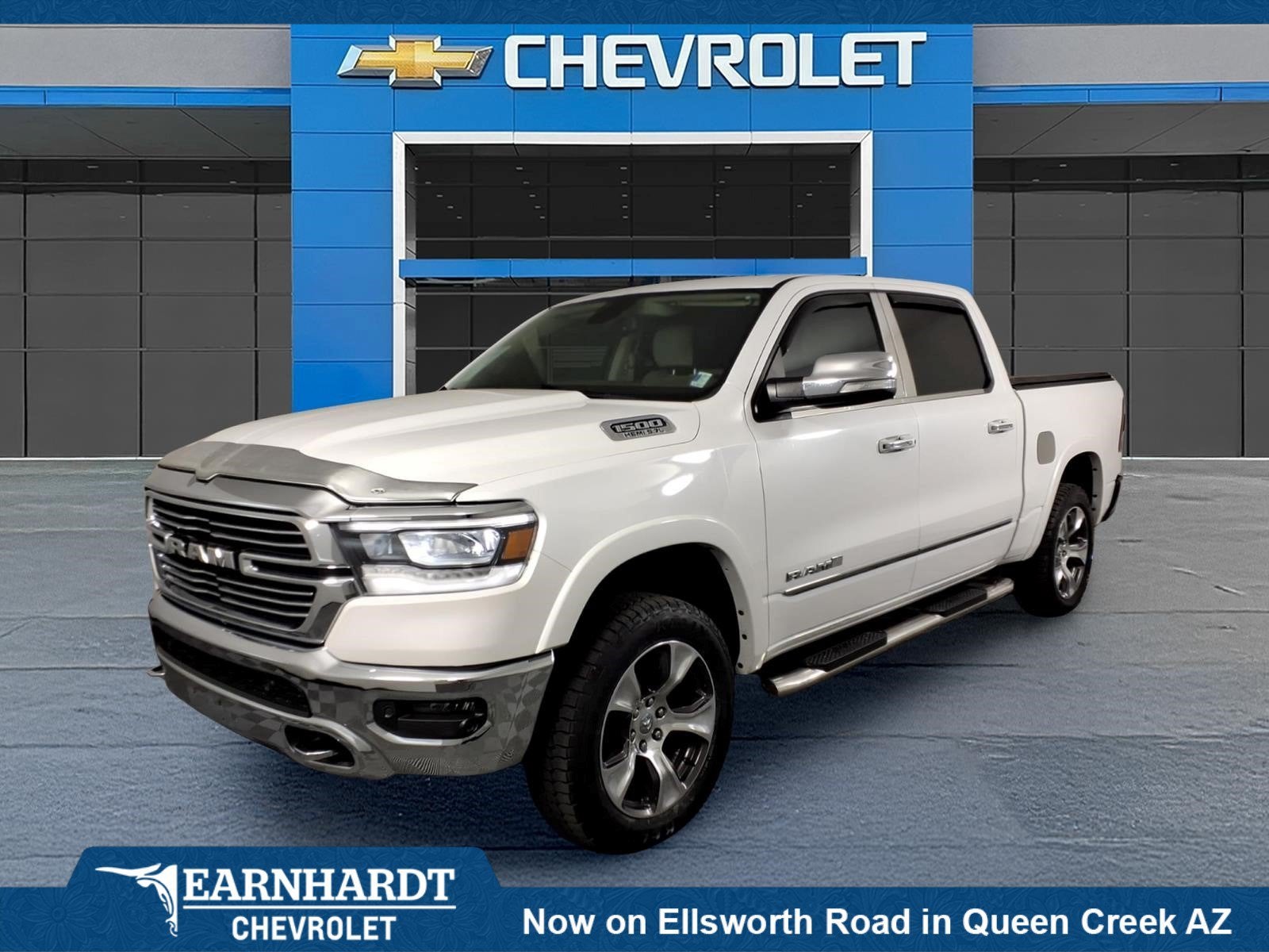 2019 RAM 1500 Laramie in White — front three-quarter view